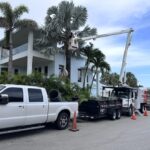 Tree trimming with workers and truck for Tree Maid Tree trimming and tree removal near you